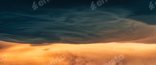 Preview: Dramatic asperitas cloud and dark sunset sky