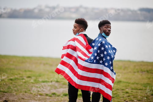 Preview: African teenagers friends with USA flag