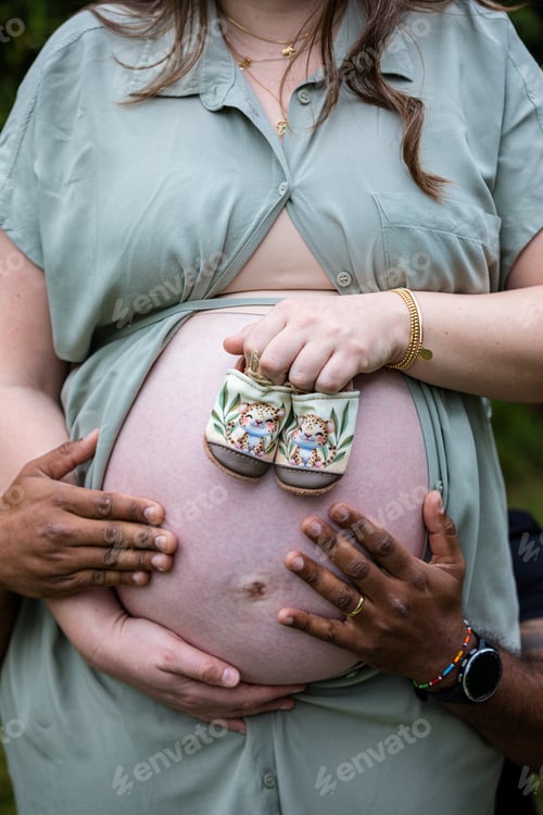 Preview: Baby bump pregnancy maternity hands details outdoors gardens Kenya