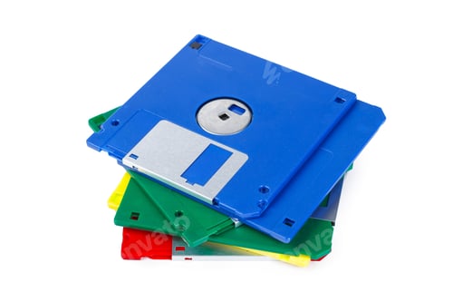 Preview: Stack of colorful floppy disks on a white background for data storage