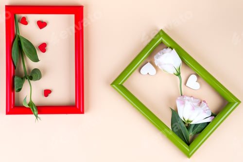 Preview: Two color frames with red hearts and flowers eustoma on beige paper background with copy space. Love
