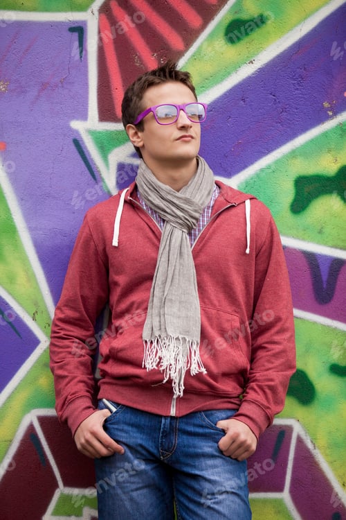 Preview: Style teen boy near graffiti background.