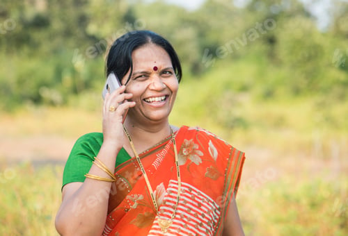 Preview: Indian woman talking on smartphone.