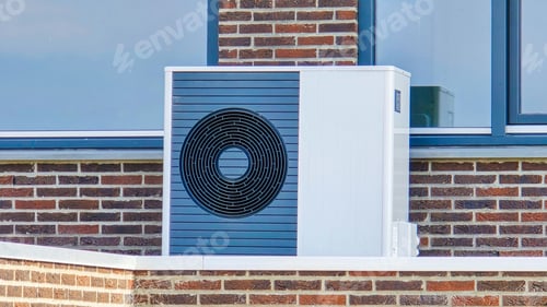 Preview: air source heat pump unit installed outdoors at a modern home with bricks in the Netherlands