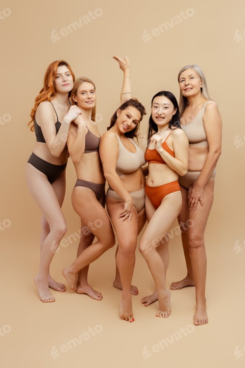 Preview: Smiling, diverse, beautiful, multiracial women wearing stylish lingerie looking at camera