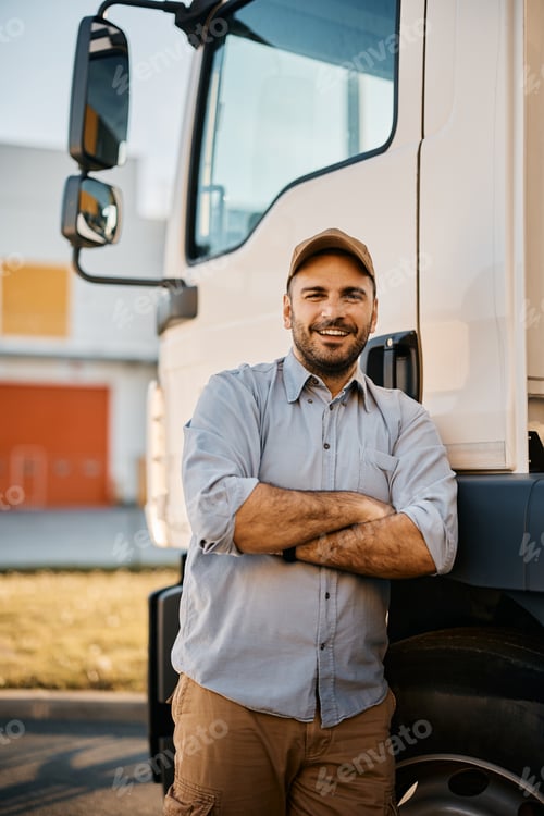 Preview: Portrait of confident truck driver looking at camera.