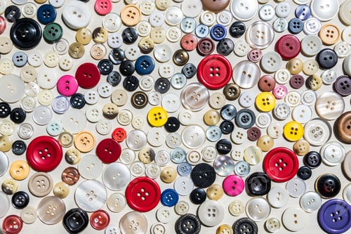 Preview: High angle shot of a bunch of colorful decorative buttons