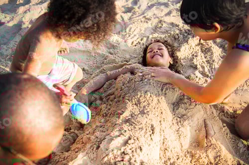 Preview: Family playing together at the beach