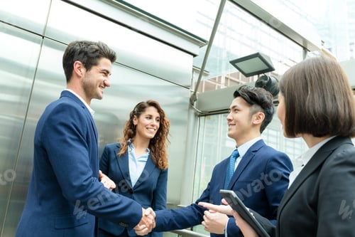Preview: Group of business people hand shaking