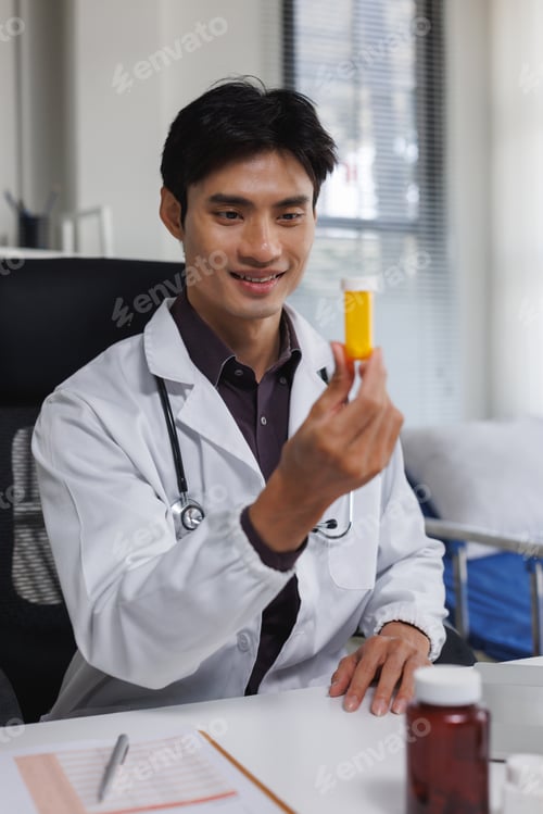 Preview: Doctor examining medicine bottle, providing pharmaceutical care