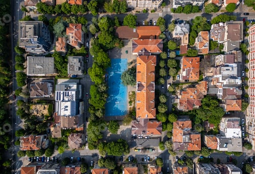 Preview: Aerial view of a school or residential block in Varna, Bulgaria. Red rooftops, tree-lined streets, a