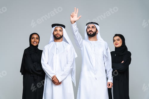 Preview: Beautiful arab middle-eastern woman with traditional abaya in studio