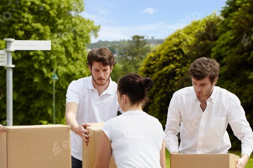 Preview: People stacking cardboard boxes