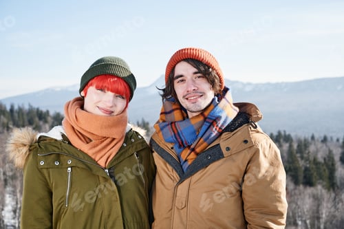 Preview: Young Couple On Mountain Top