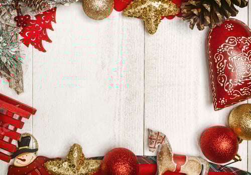 Preview: Christmas frame on white wood background.