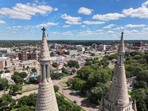 Preview: Aerial view of town skyline with two towering spires