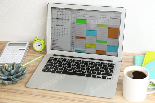 Preview: Modern laptop with calendar app in office