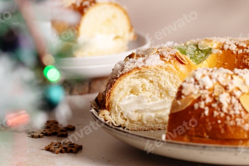 Preview: Spanish Three kings cake on decorated table with Christmas tree, celebration of Three Kings Day