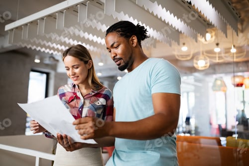 Preview: Successful group of designers, business people at work in office