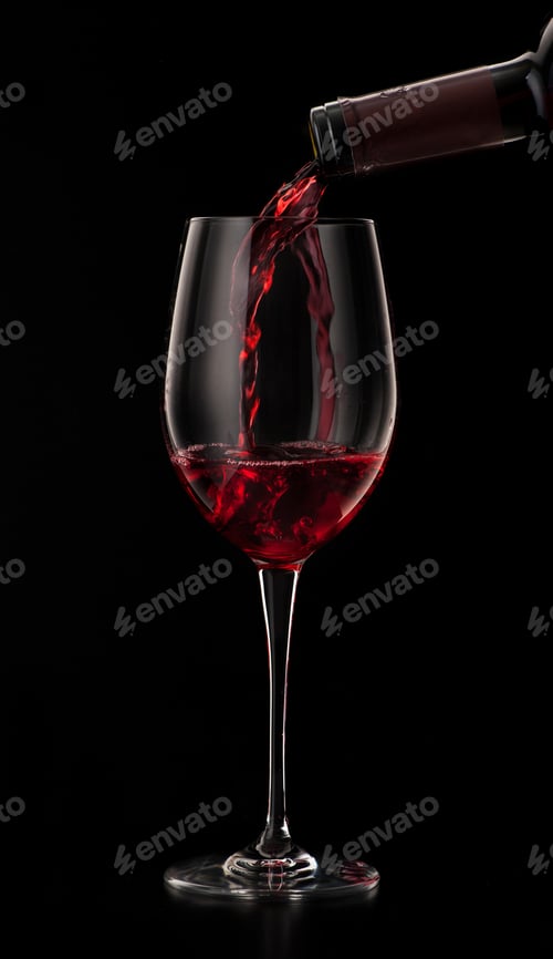 Preview: red wine pouring in glass