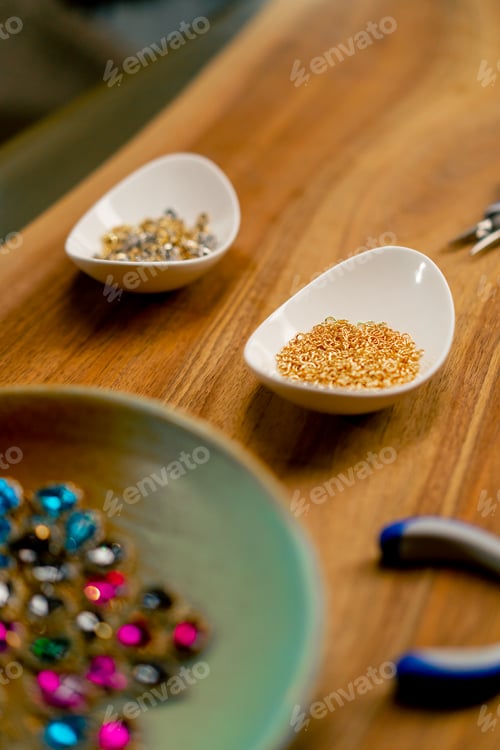 Preview: close-up of different types of pearl beads and pendants create beautiful expensive craft jewelry
