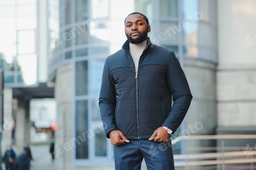 Preview: African American man in stylish new clothes on the street