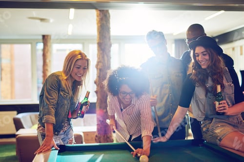 Preview: Female pool player taking aim at the cue ball