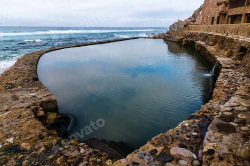 Preview: Discover the serene beauty of Azenhas do Mar natural pool overlooking the Atlantic coast.