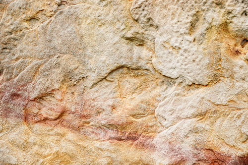 Preview: Stone background texture. Old aged beige stone wall or floor, rock pattern