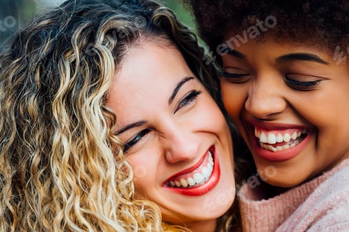 Preview: Beautiful lesbian couple having fun at the street