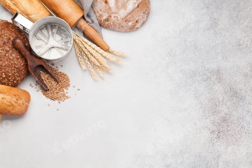 Preview: Various bread with wheat, flour and cooking utensils
