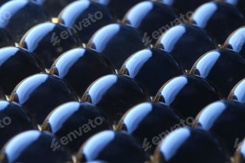 Preview: Close-up large glass balls lie next to each other