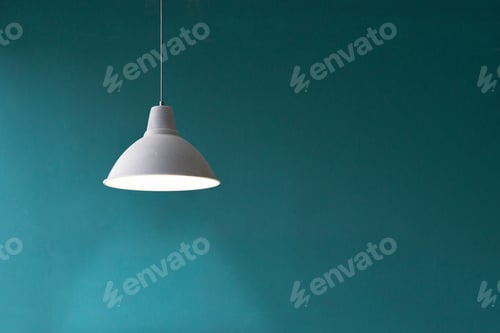 Preview: Pedant white lamp hung in front of a blue wall