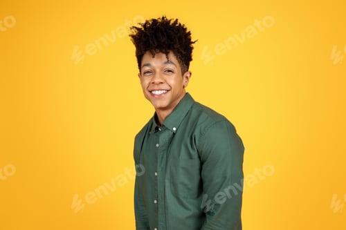 Preview: Happy young black man smiling brightly