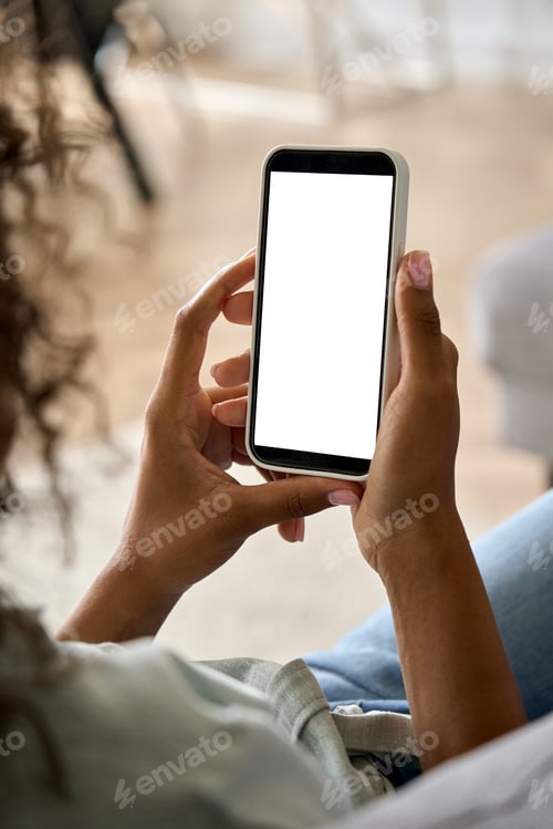 Preview: African American woman hand holding phone with mockup white blank display.