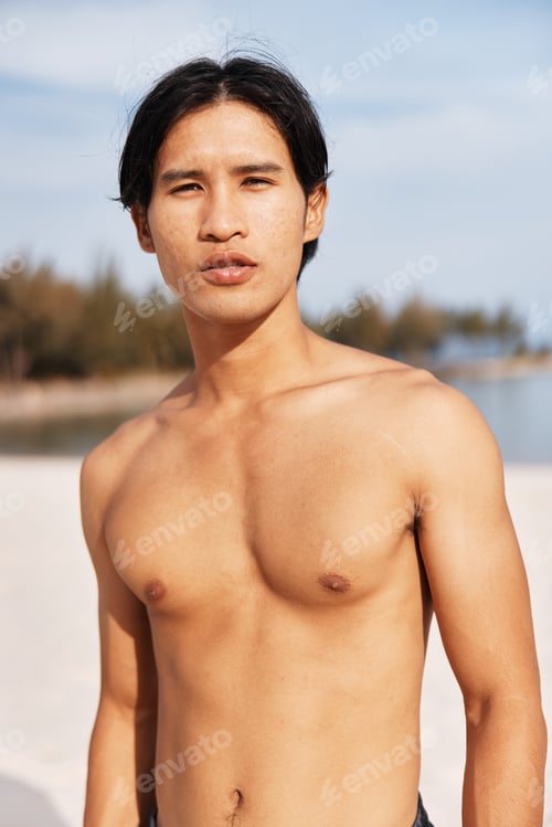 Preview: Active Asian Athlete Running on Beach: Muscular Man Embracing the Summer Fitness Lifestyle