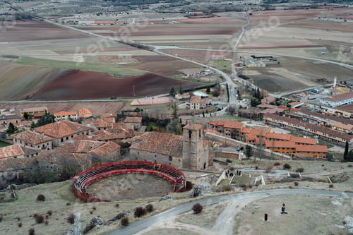 Preview: View of the historic town of Atienza with stone houses and thr bullring