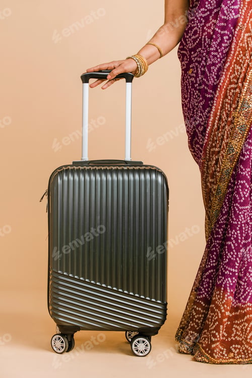 Preview: Indian woman in a saree ready for boarding