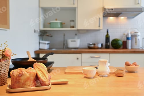 Preview: Fresh homemade bread and ingredients on wooden kitchen tabletop. Copy space for your text