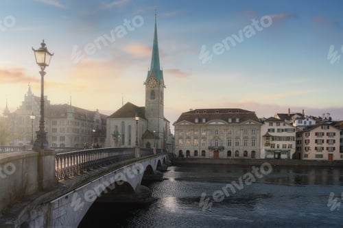 Preview: Fraumunster Church and Munsterbrucke Bridge at sunset - Zurich, Switzerland