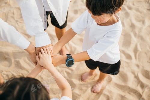 Preview: Beach teamwork for family success. Hands stack in unity representing achievement. Parents and
