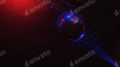 Preview: Beautiful Disco Ball Spinning seamless with flares. Mirror ball with bright rays, night party
