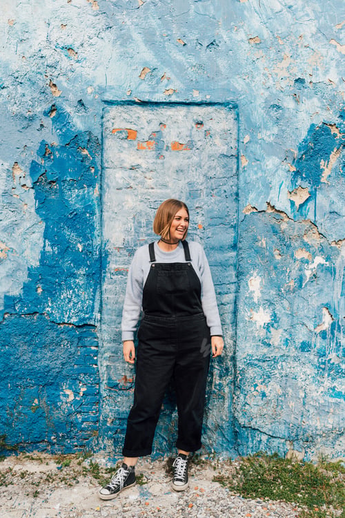 Preview: Portrait of woman, weathered wall in background