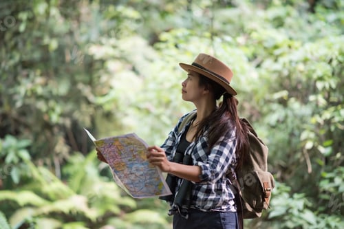 Preview: young women people and taking photo camera and looking happy ,Relax time on holiday concept travel.