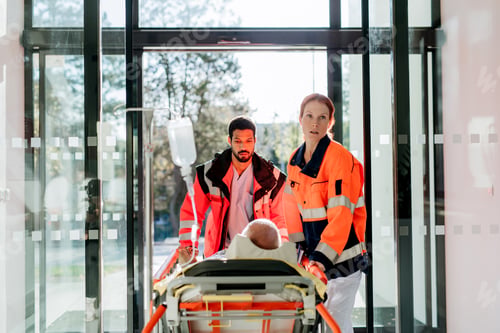 Preview: Rescuers bringing patient with serious injury to hospital.