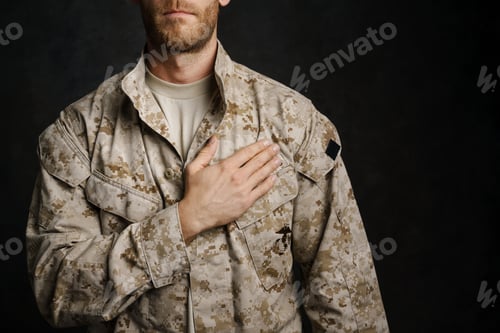 Preview: White military man wearing uniform holding hand on his chest