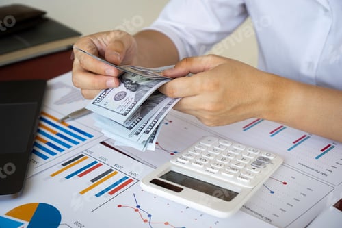 Preview: businesswoman counting money, finance, saving, banking, and people concept - close up of woman hands