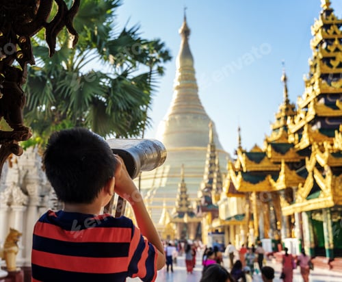 Preview: Local boy children look at the famous Shwedagon Pagoda