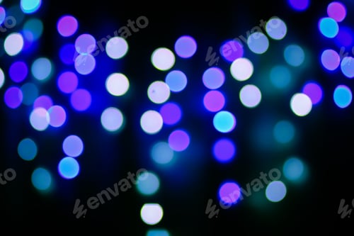 Preview: Abstract bokeh background. Blurred garland lights.