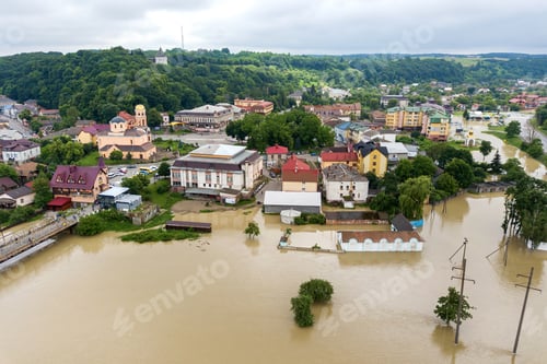 Preview: Aerial view of flooded houses with dirty water of Dnister river in Halych town, western Ukraine